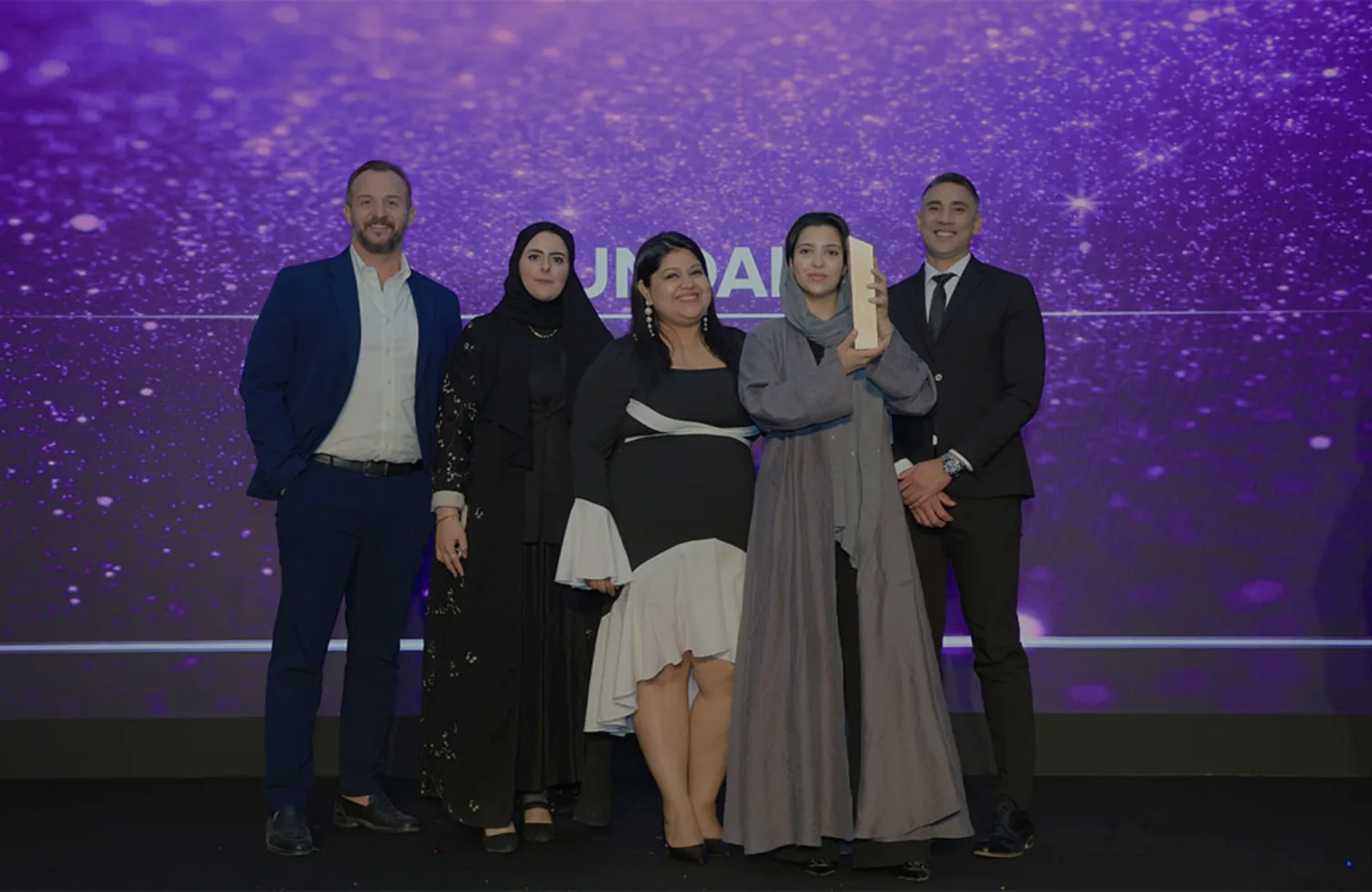 KSA team collecting an award