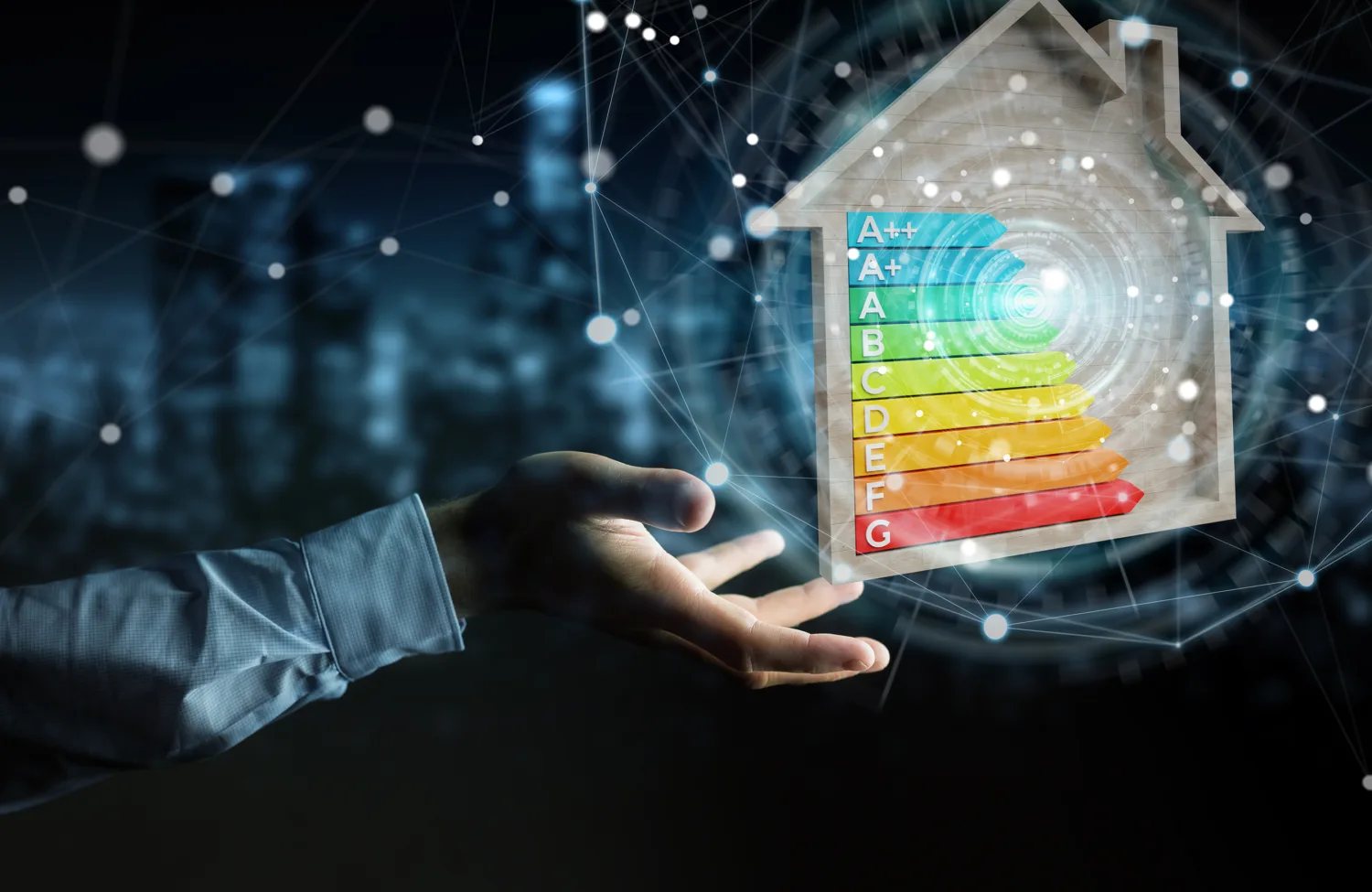 Hand reaching toward a glowing house icon displaying an energy efficiency rating scale from A++ (green) to G (red). Digital network pattern and blue-toned background suggest smart home or energy technology.