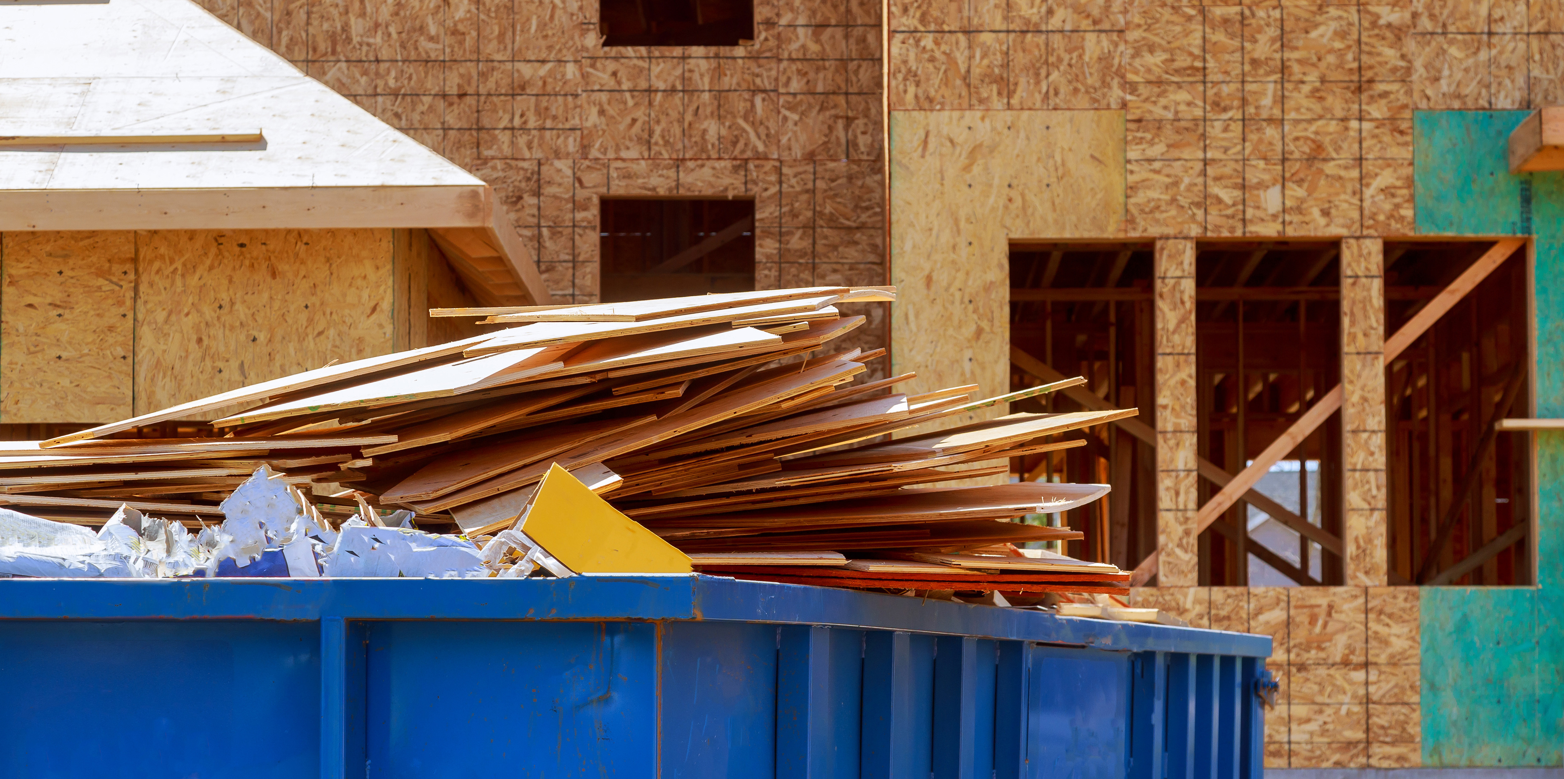 Residential view of new houses being built and construction garbage