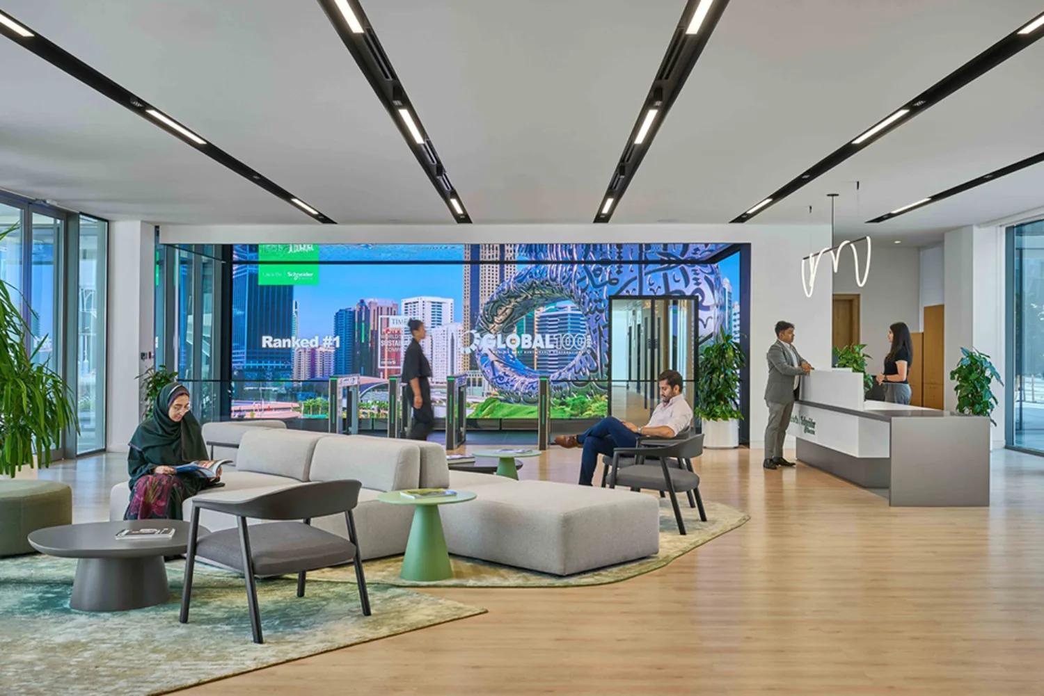 Office reception area with table and sofa space