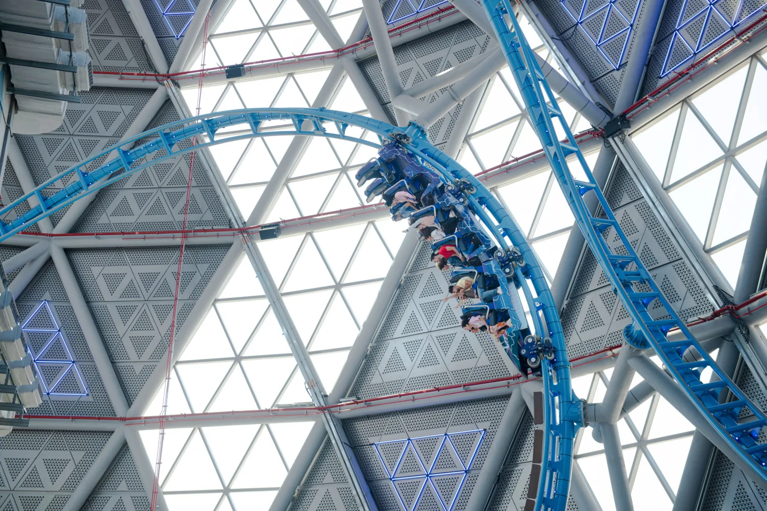 People experiencing an upside down loop on The Storm roller coaster