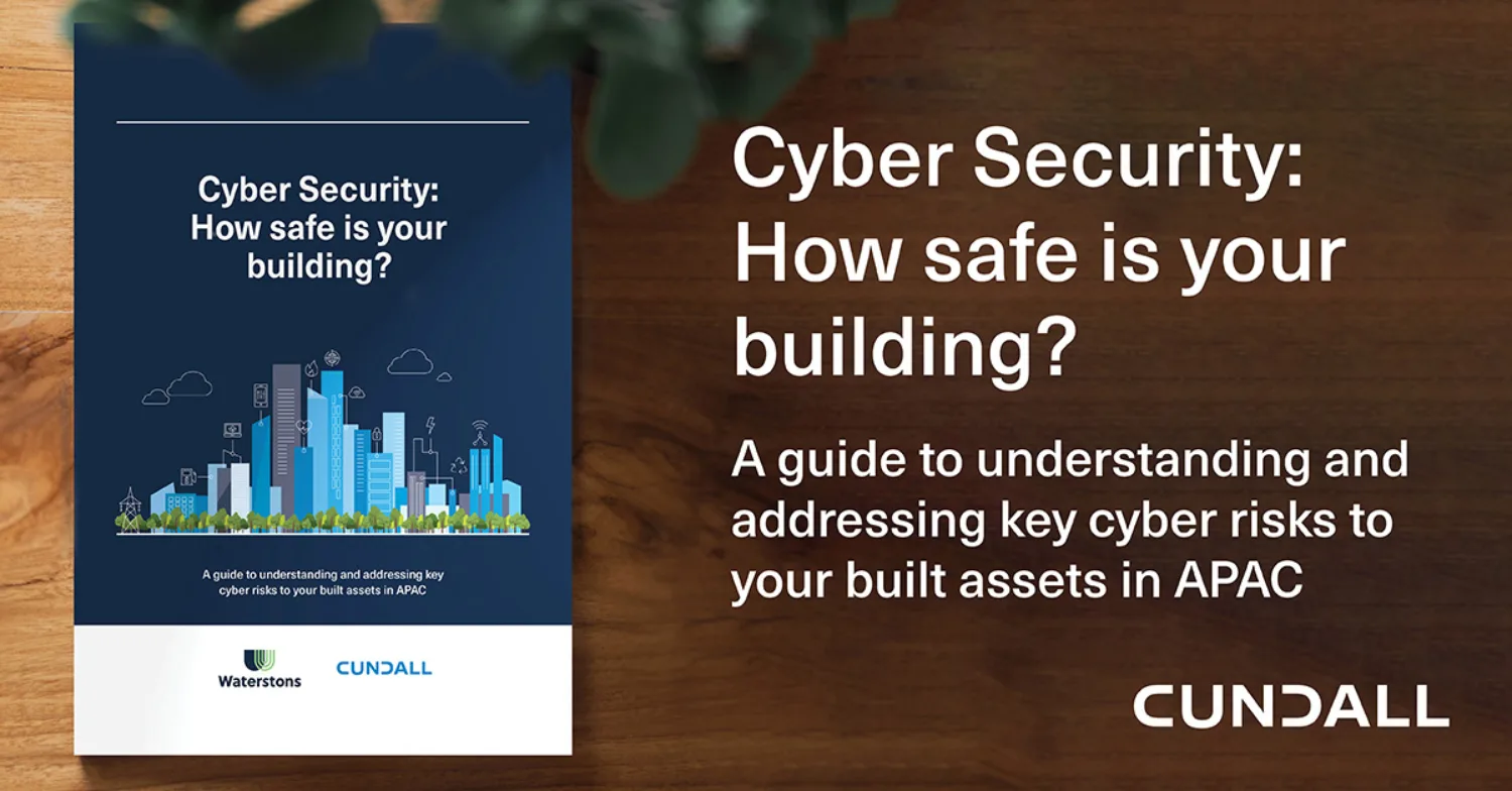 Image of the Cyber security guide superimposed on a wooden coffee table