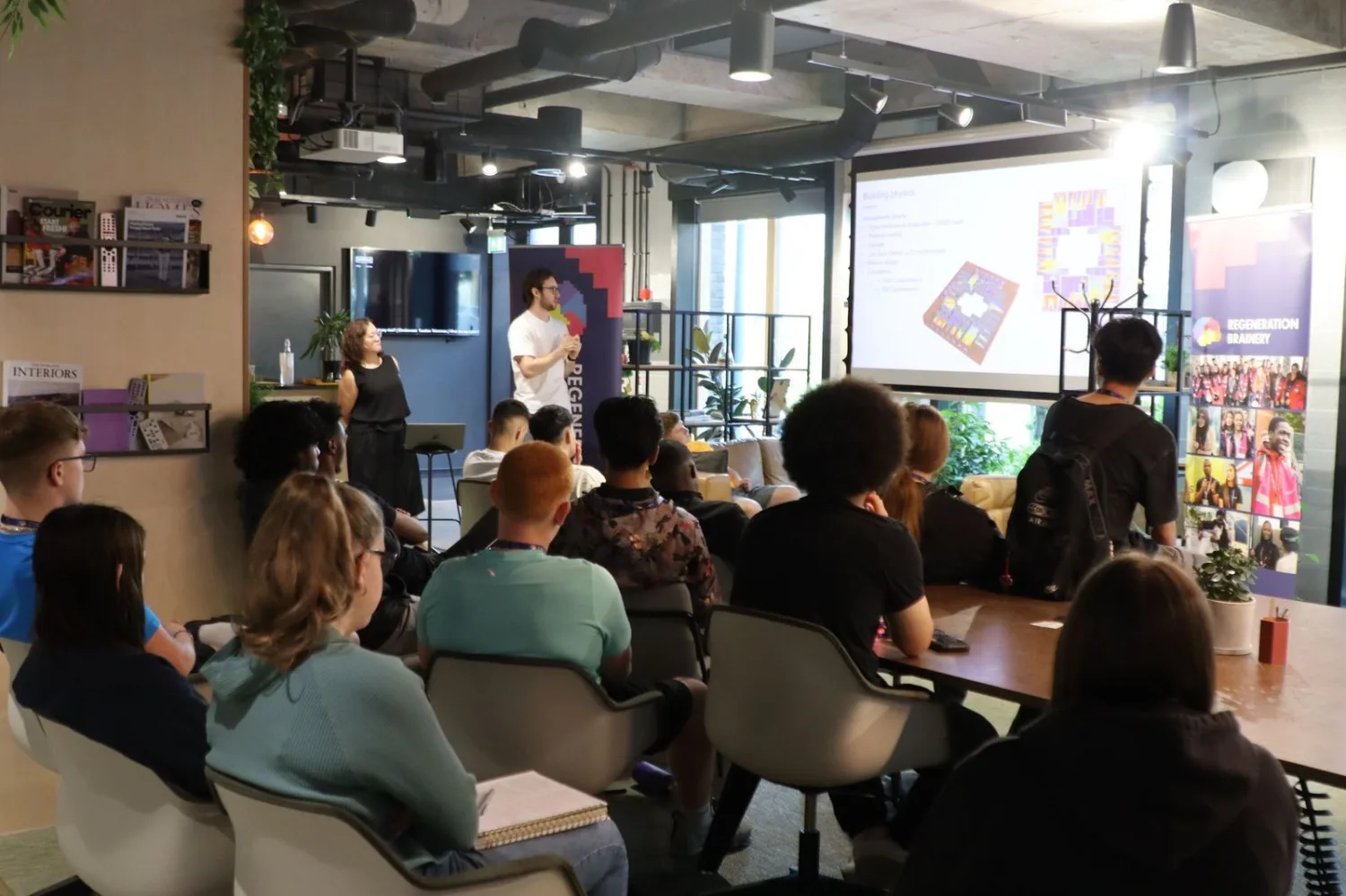 Rgeneration Brainery seminar with people looking at screen