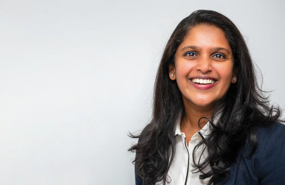 Smitha Mathew smiling in front of the camera