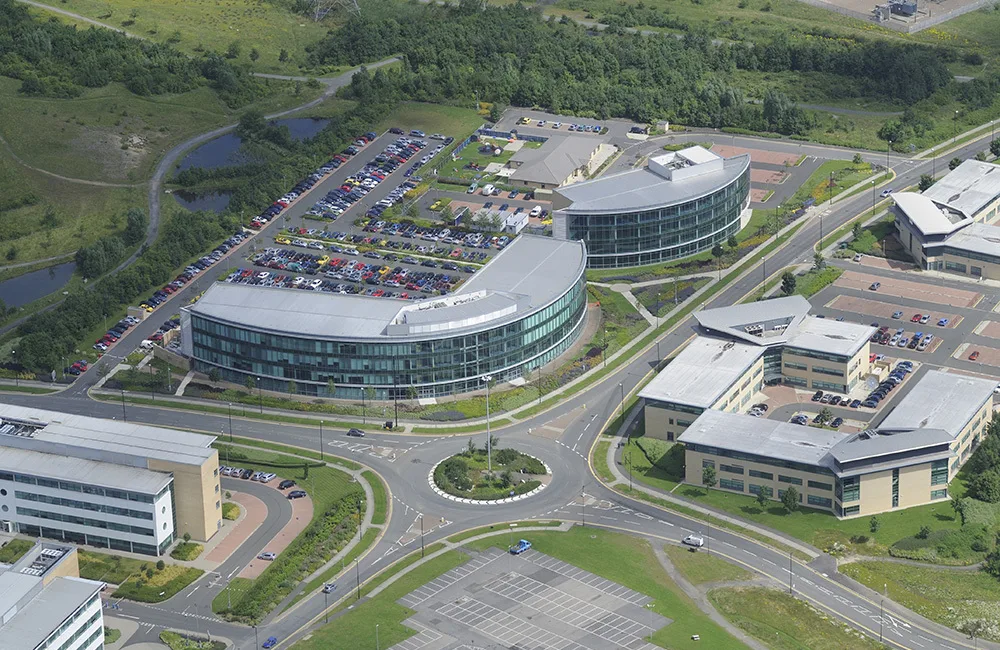 Aerial view of Newcastle business park with buildings, carpark and road layout shown