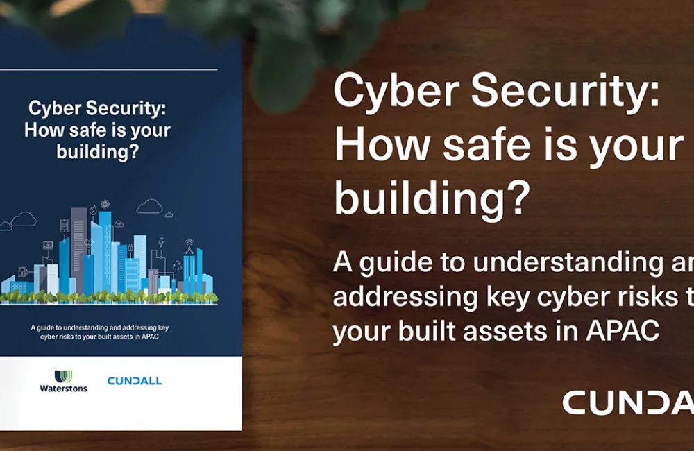 Image of the Cyber security guide superimposed on a wooden coffee table