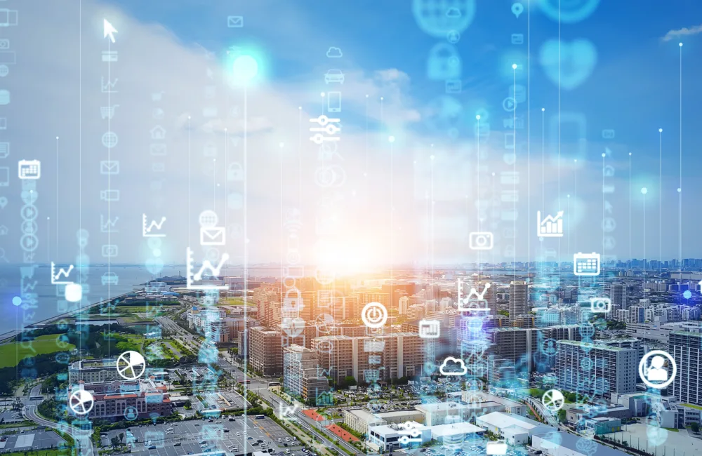Daylit cityscape overlaid with information icons and data lines