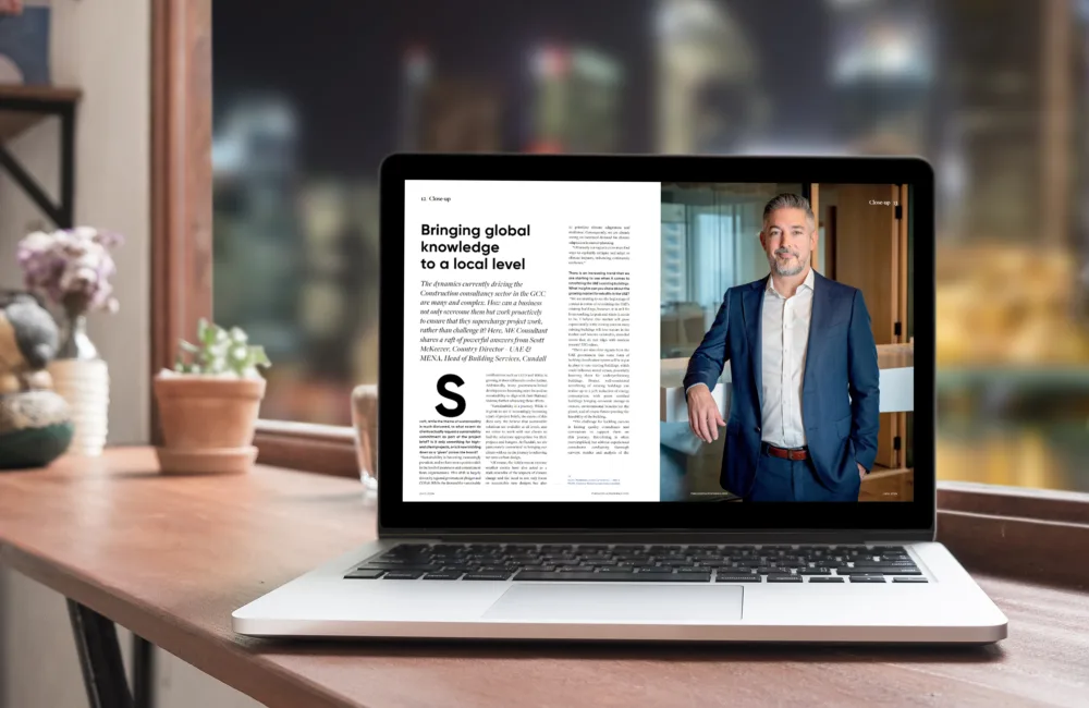 A page of Scott McKeever's article previewed on a laptop mock-up