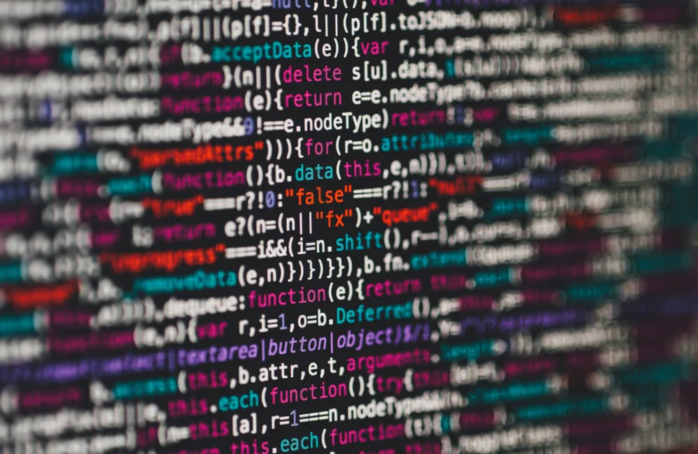 A close up of a screen full of computer code