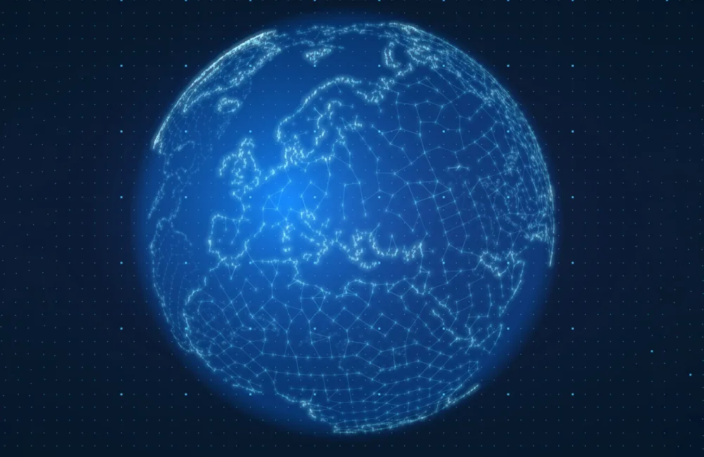 Blue globe created of digital imagery against a dark blue background