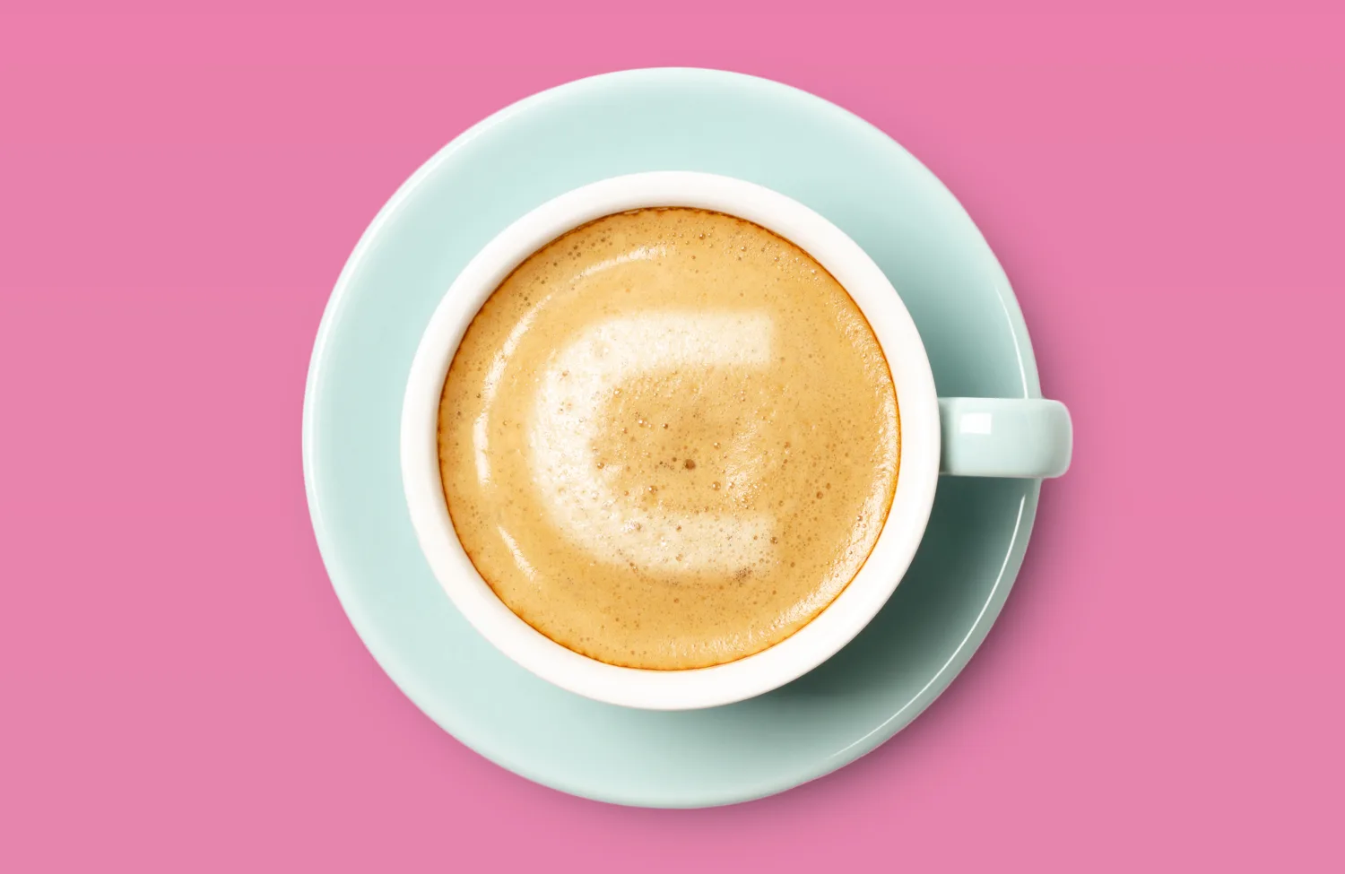 Edinburgh's June pink background with Cundall C latte art on the coffee.