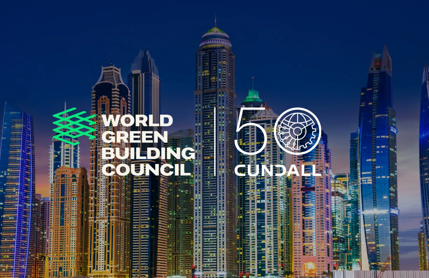 Dubai skyline at dusk with illuminated high-rise buildings, overlaid with World Green Building Council and Cundall 50 logos.