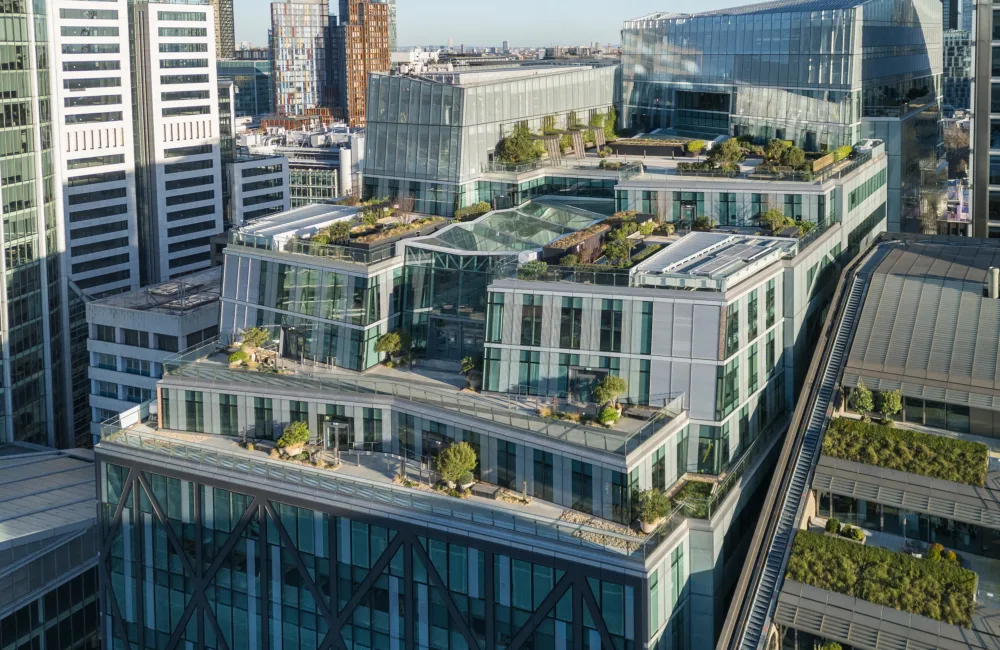 Aerial view of 21 Moorfields - modern glass building with 6 roof terraces and greenery