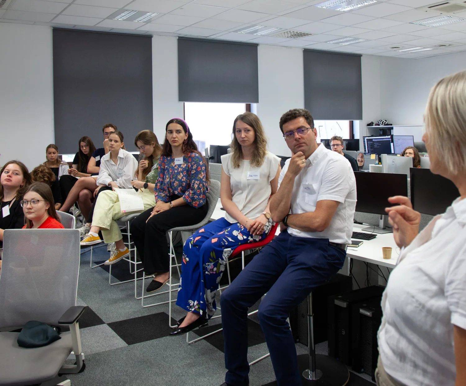 The Cundall team and students listening to the speaker.