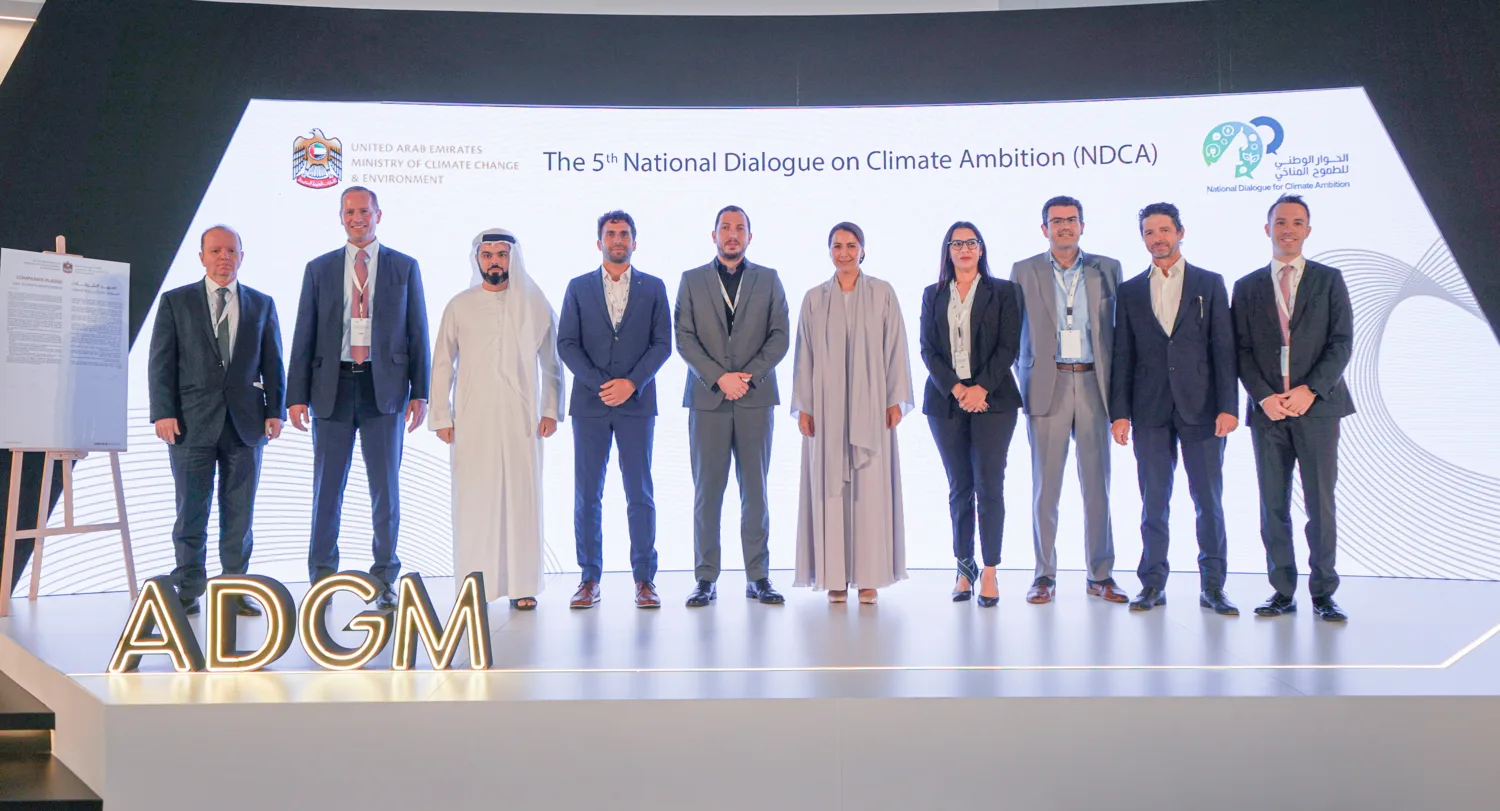 Mario Saab, Head of Sustainability, poses together with other representatives of companies who signed the pledge.