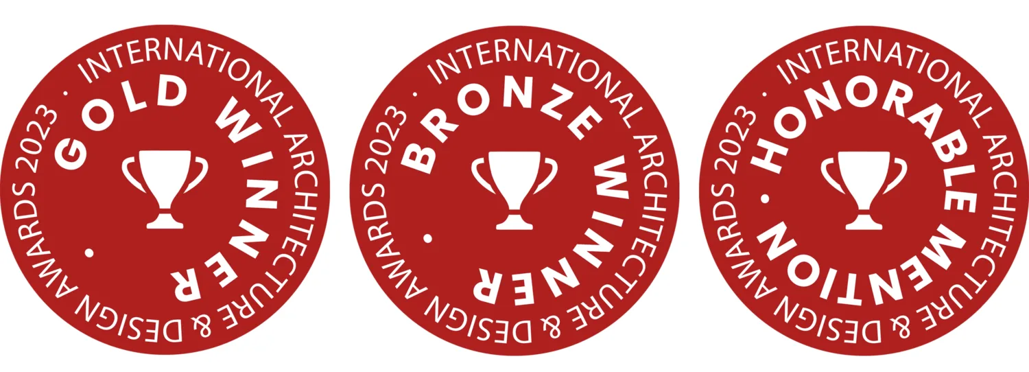 Three award badges, gold, bronze and honorable