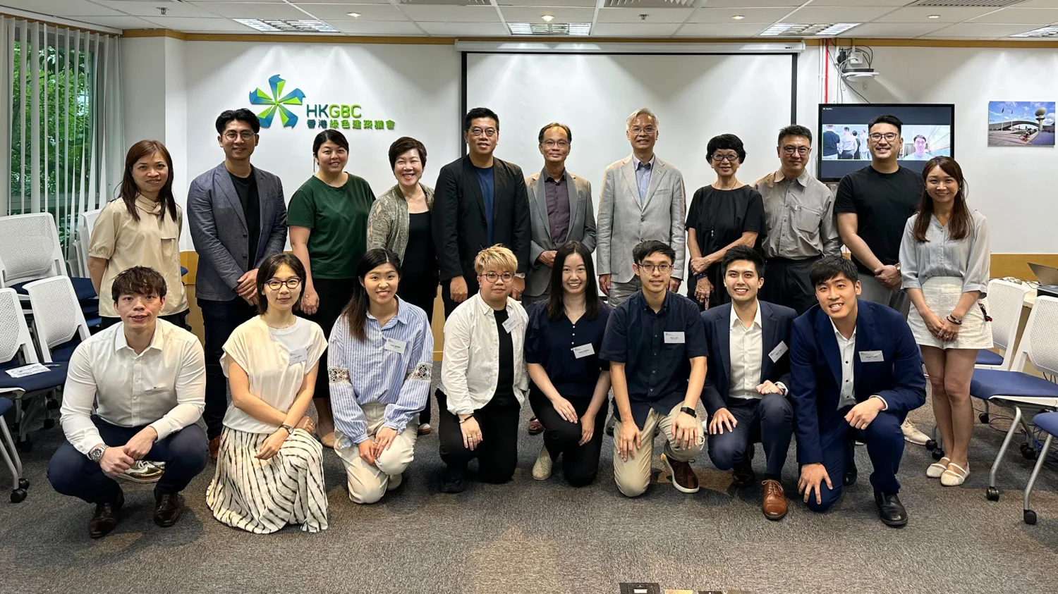 Isaac Poon taking a group picture with other members and officials of HKGBC