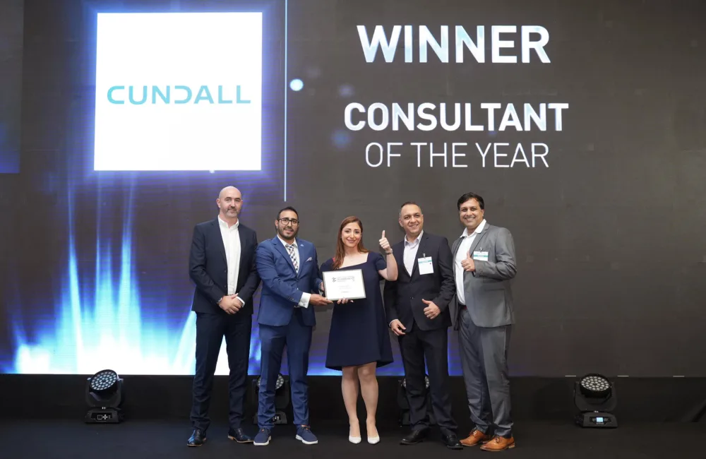 The Cundall team receiving the award on stage.