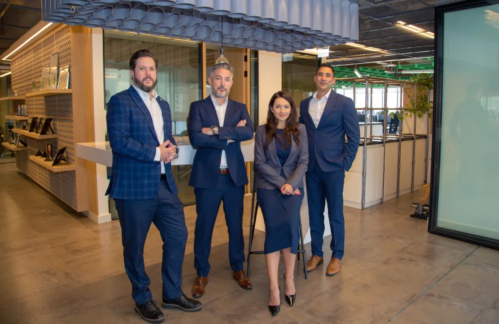 Lee French, Scott McKeever, Faiyad Peterson and Olga Litkovets posing for a group photo in our Cundall Dubai office.