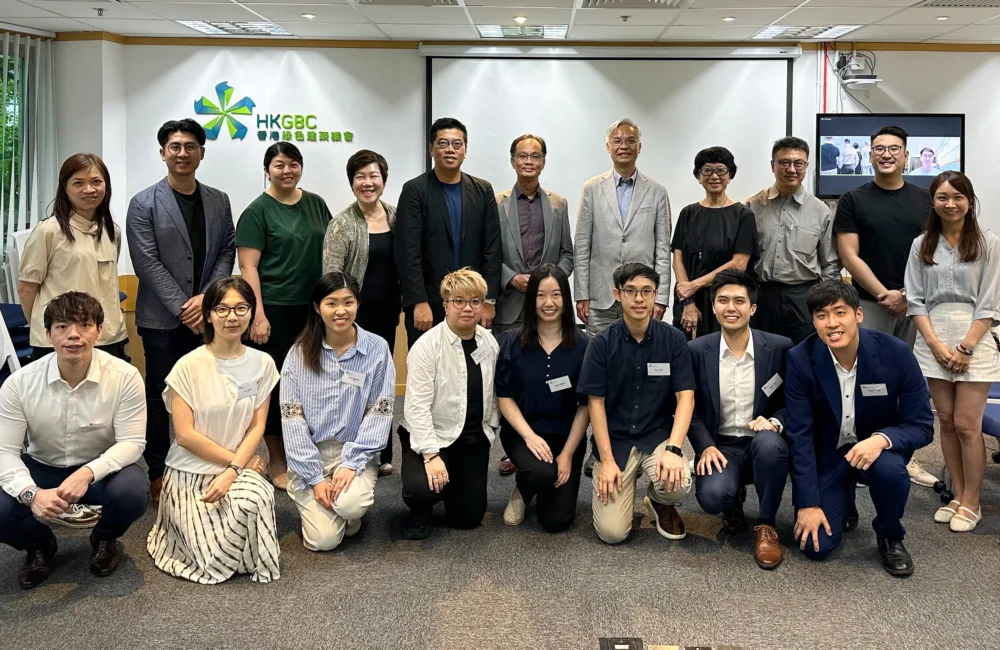 Isaac Poon taking a group picture with other members and officials of HKGBC