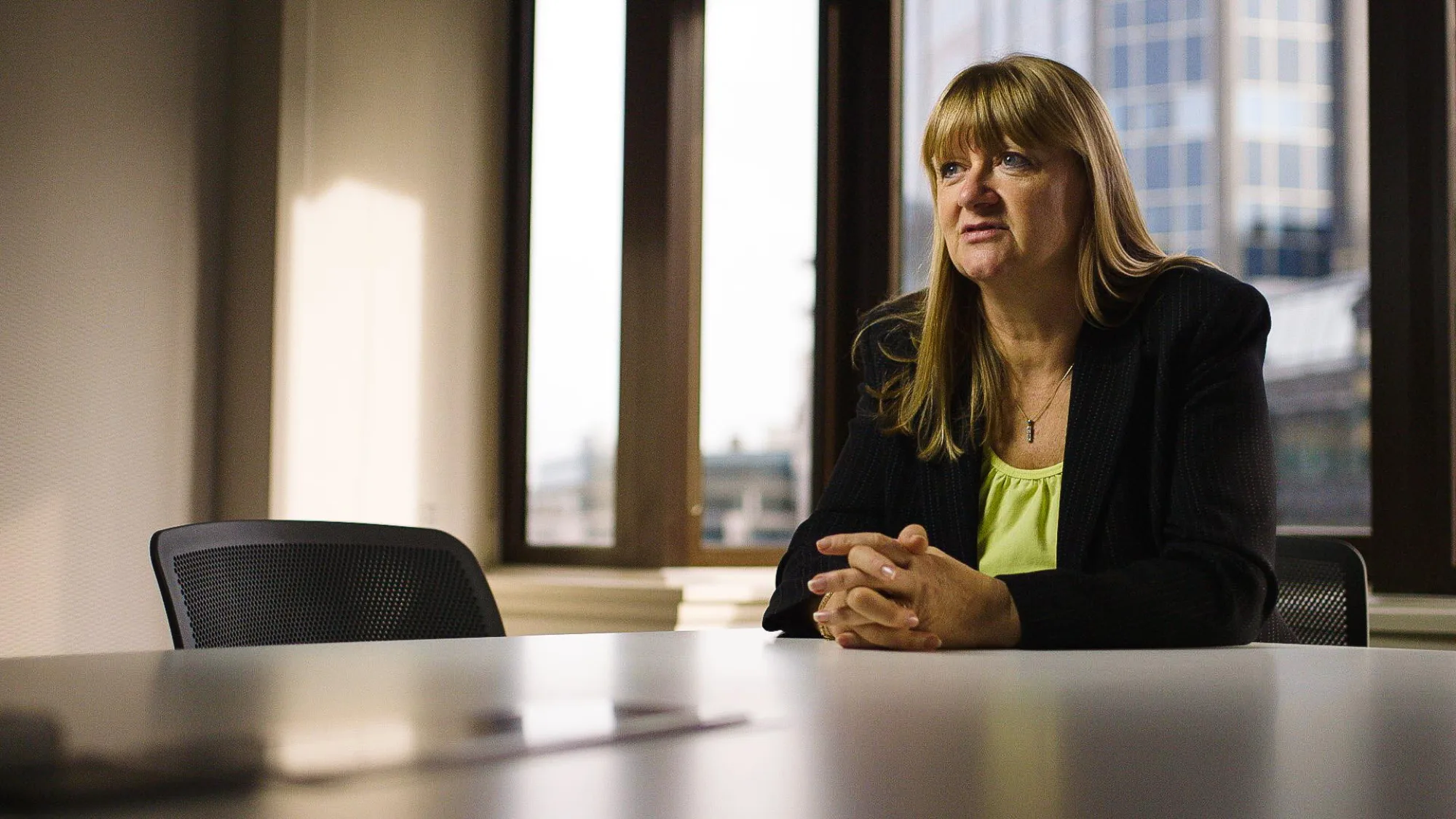 Belinda Morgan sat at a meeting room table