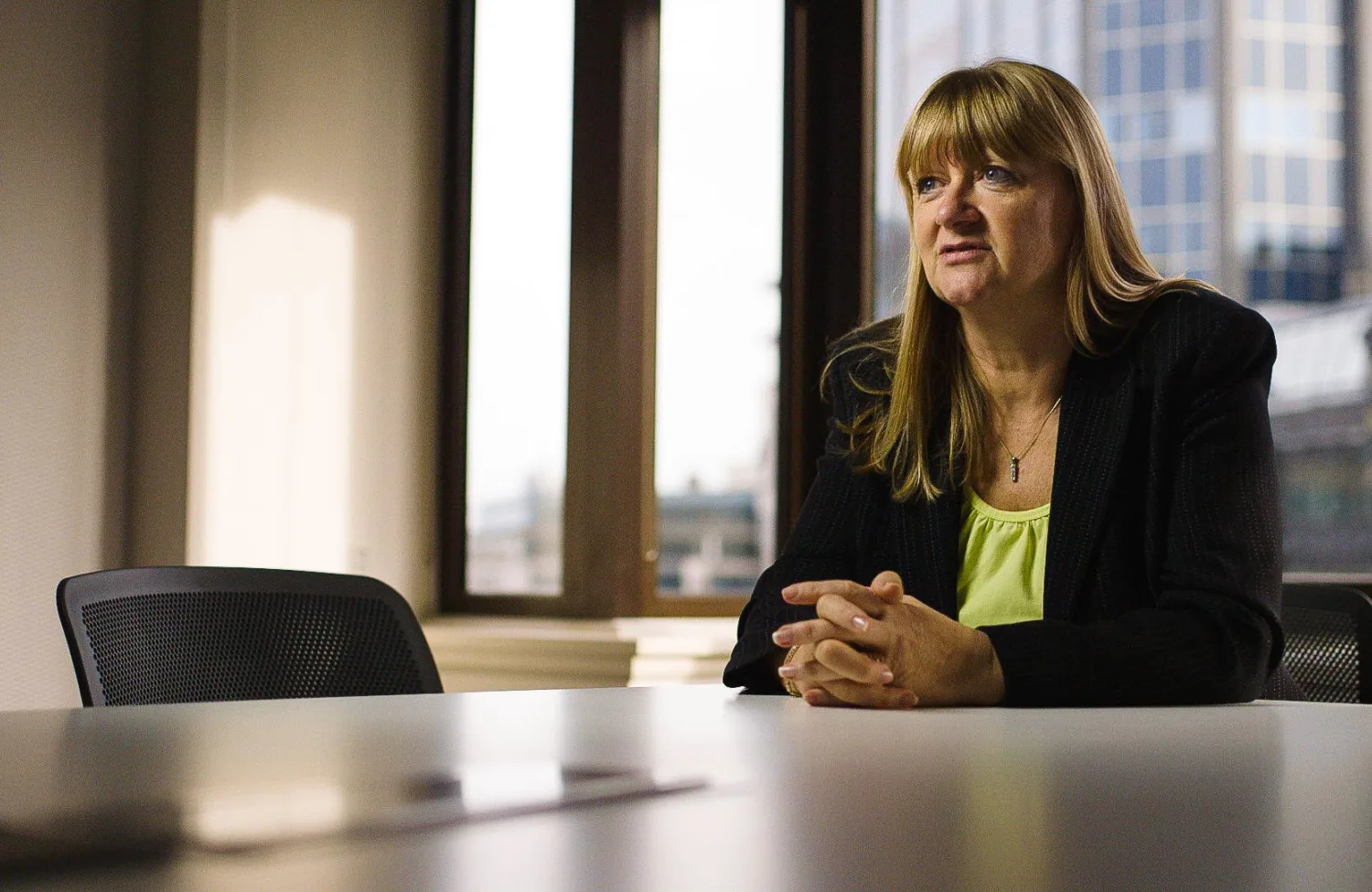 Belinda Morgan sat at a meeting room table