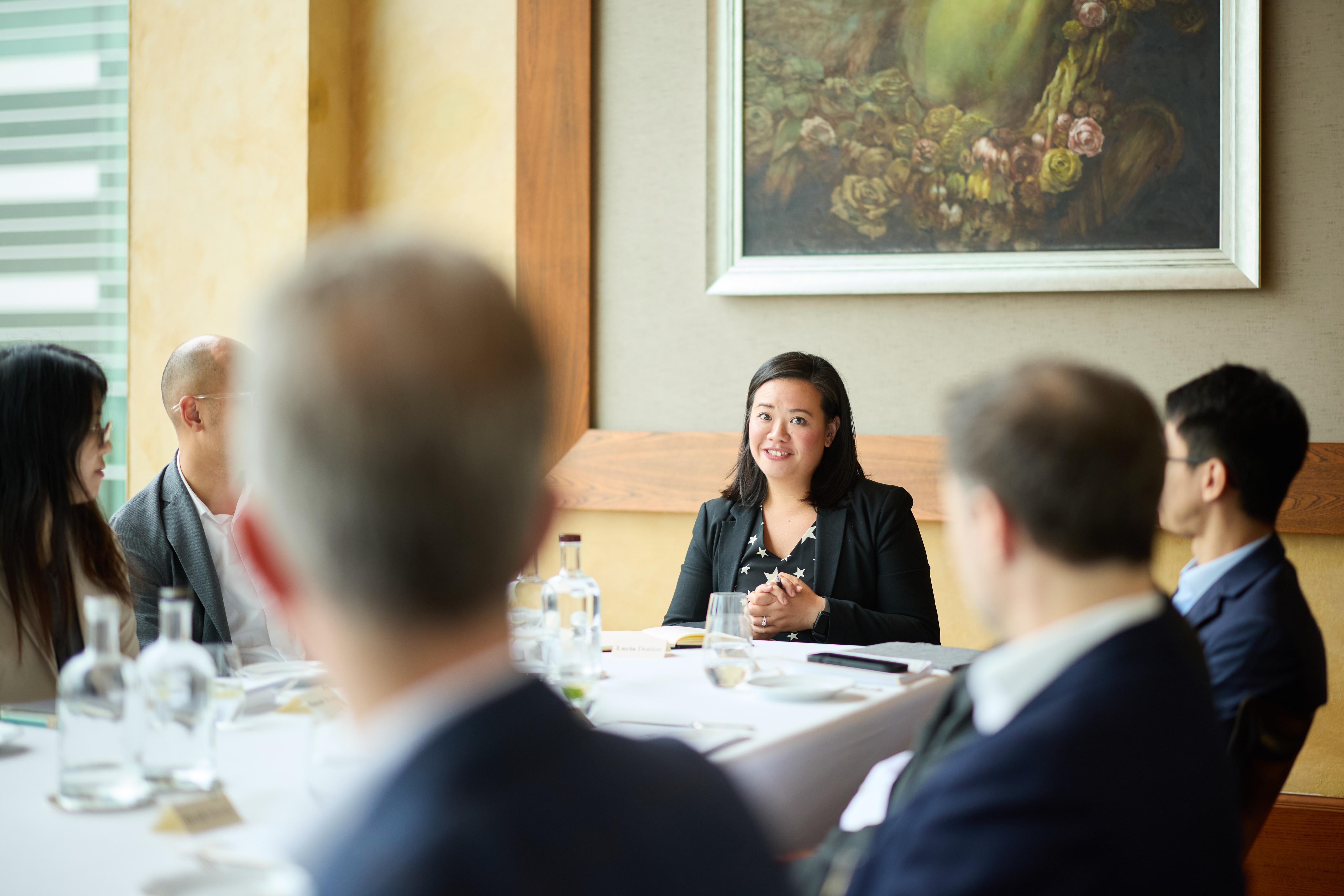 Lucia Donlon participating in a round table discussion