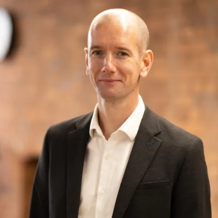 Rob Turner with red brick background