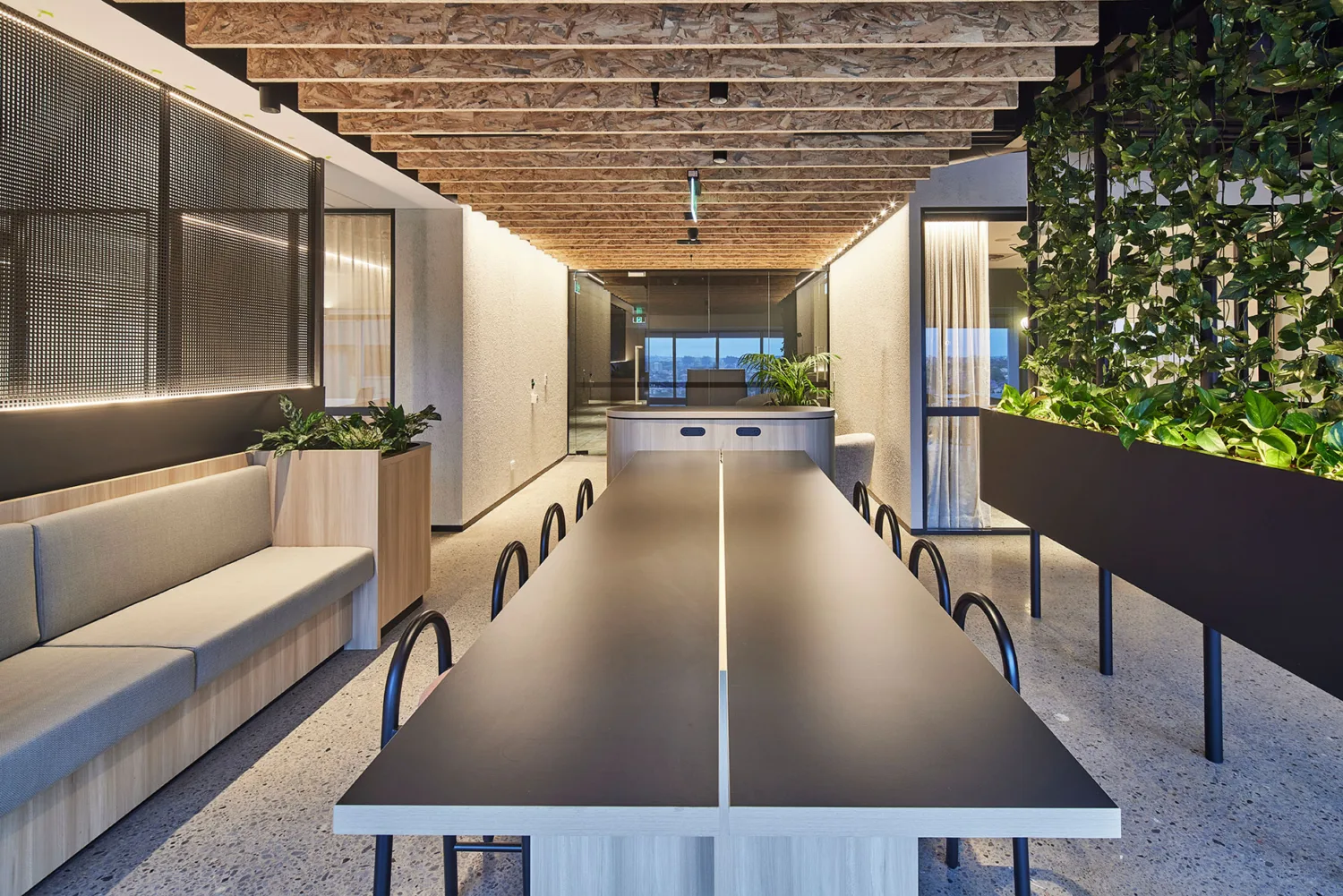 Collaboration area within office space including dining table