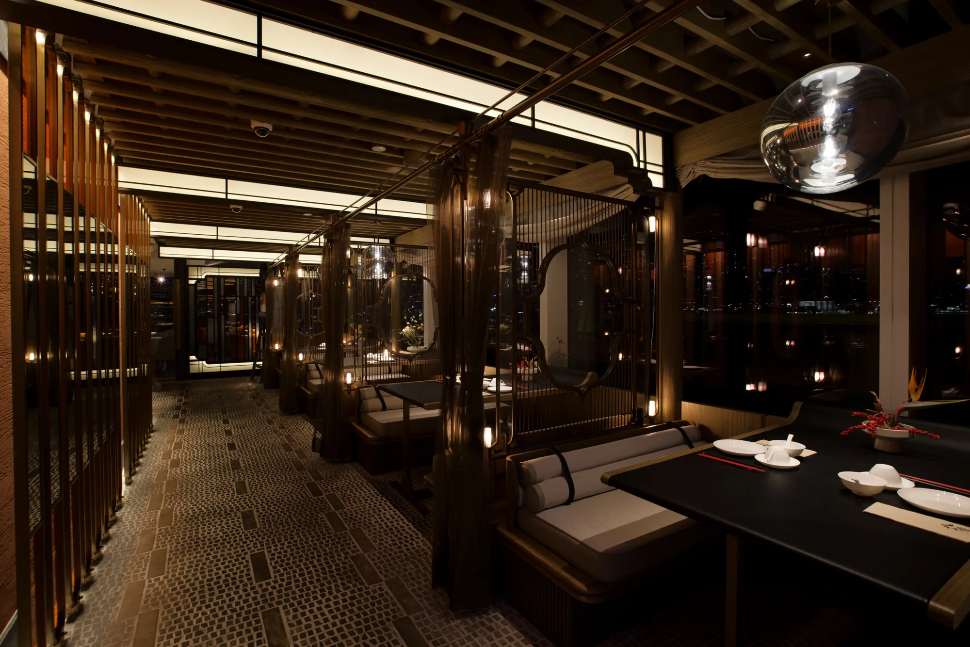 Vibrant main dining area with stylish decor, comfortable seating, and bustling atmosphere