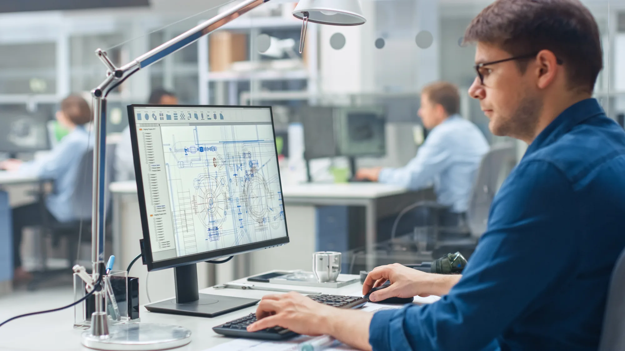 People sat at desks in a research laboratory