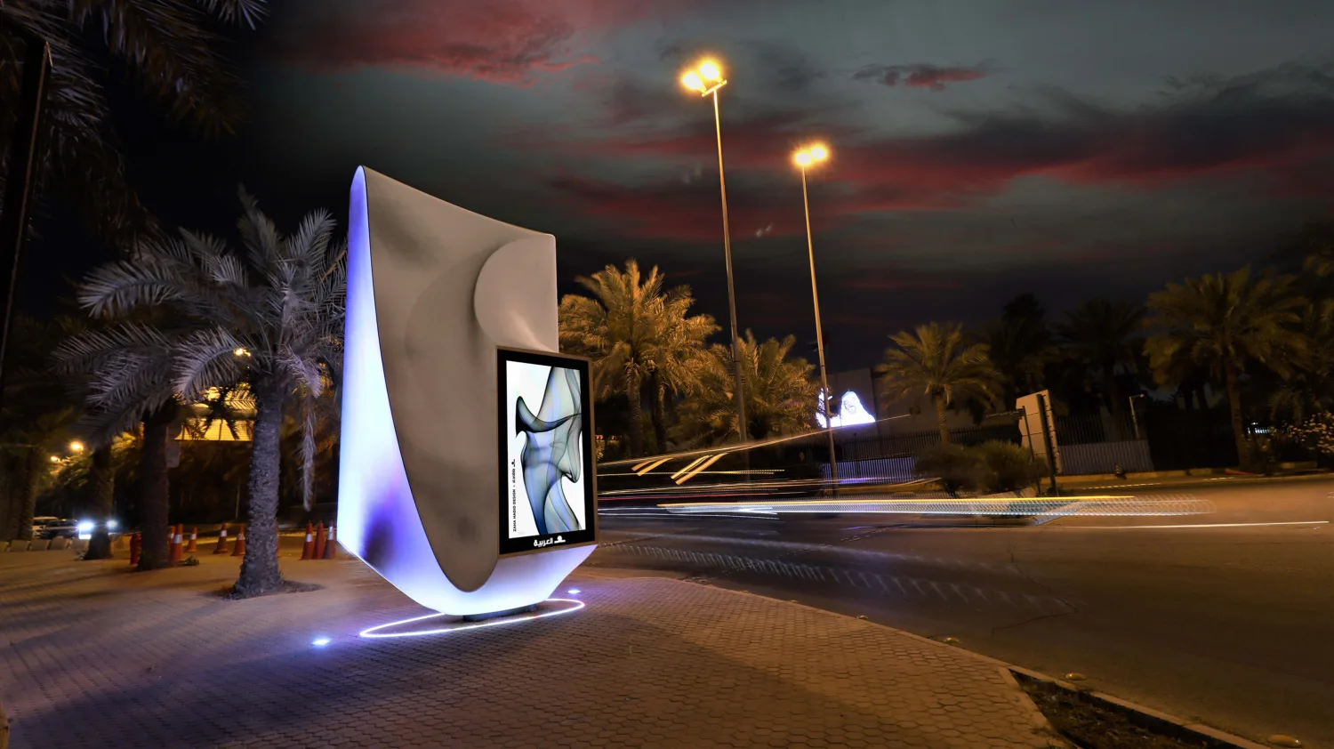 The digital advertising sculpture photographed from LCD screen side during night