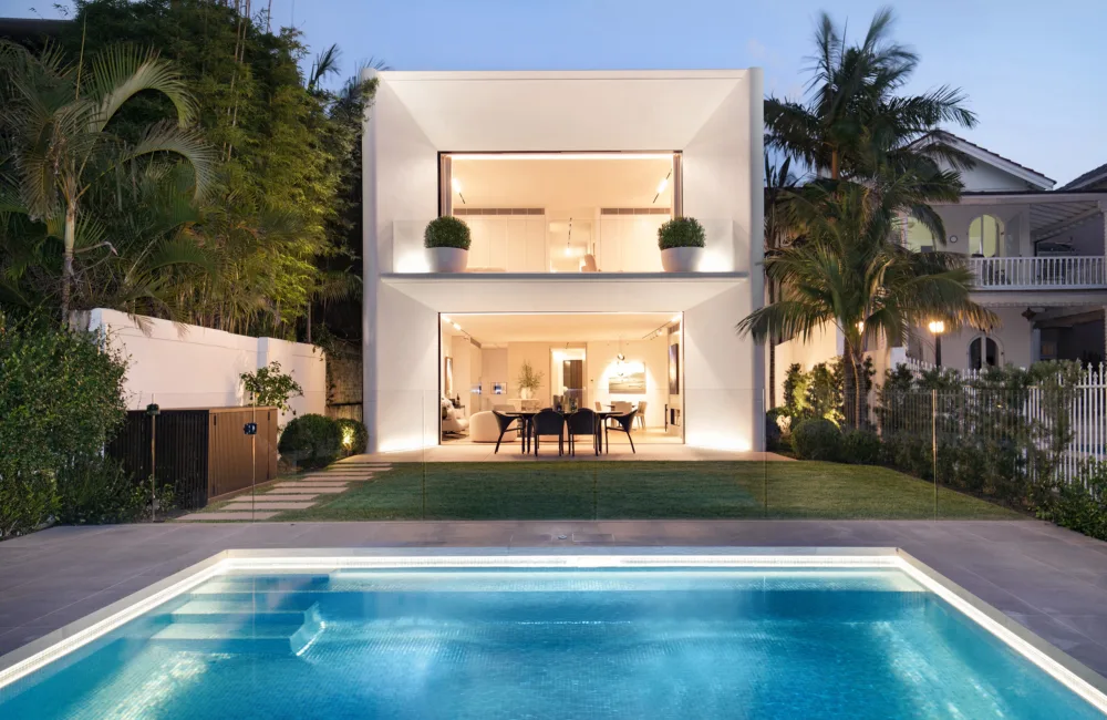 View of house from backyard, pool in foreground.