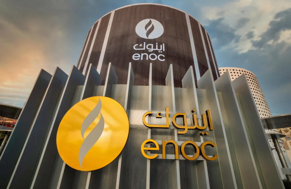 Front view of the ENOC Pavillion at the EXPO 2020 in Dubai. The ENOC logo is large and visible