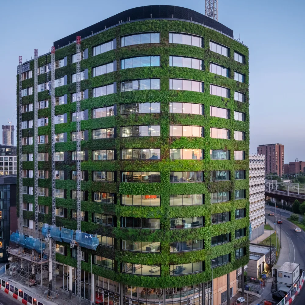 Shot of entire building with road either side against a dusky sky