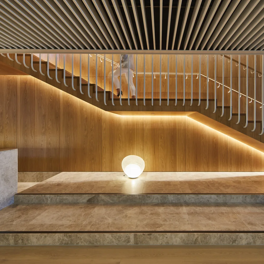 Statement staircase with bespoke lighting