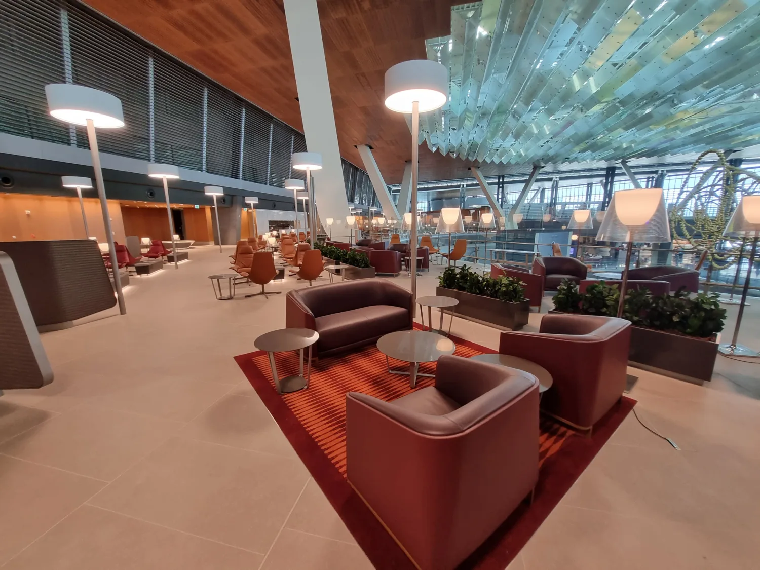 Shot of lounge seating showing airport in background