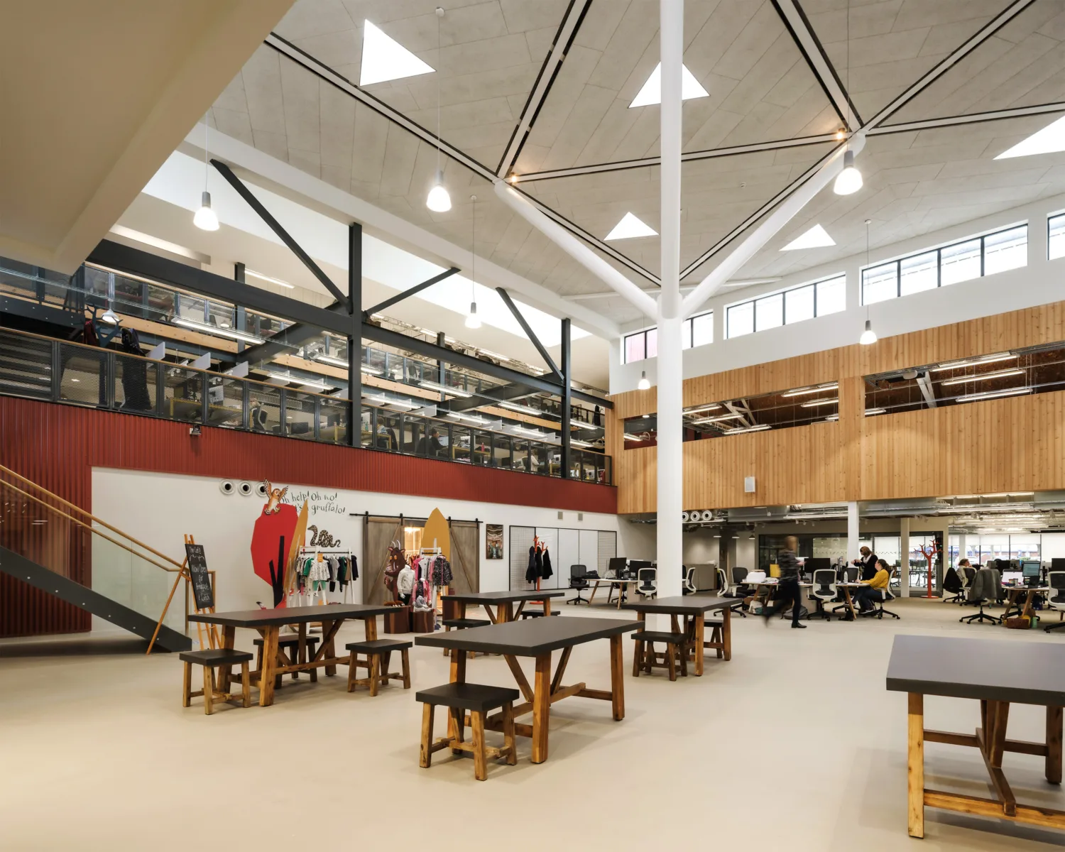 Bright, open office space with communal tables