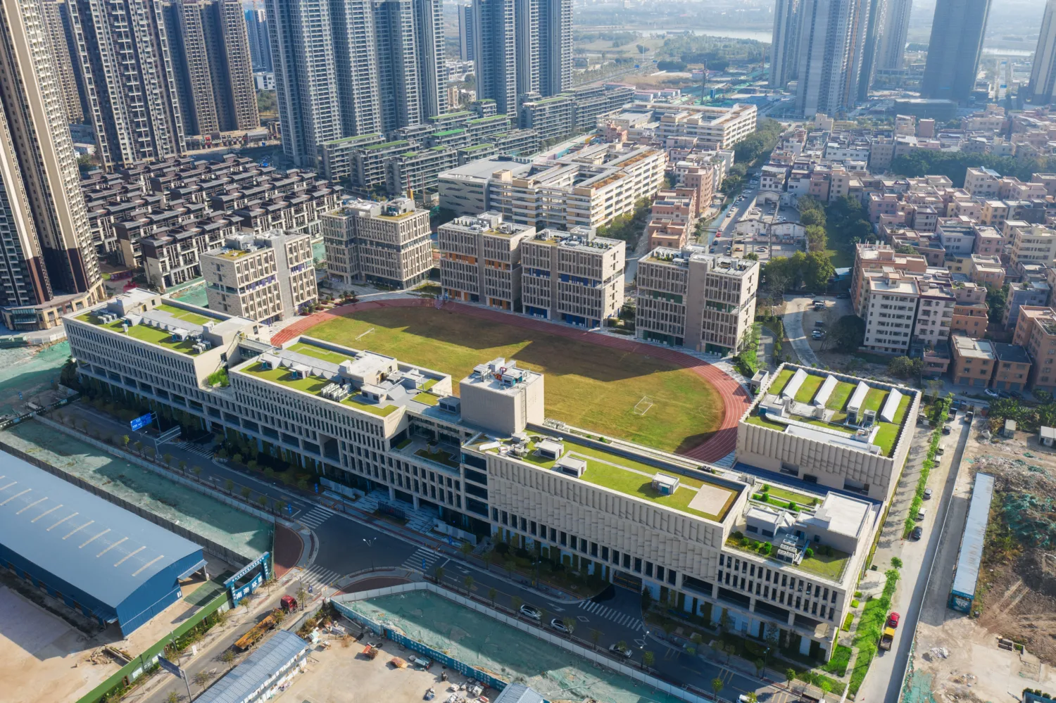 Aerial view of Lady Eleanor Holles School and it's central green and race track