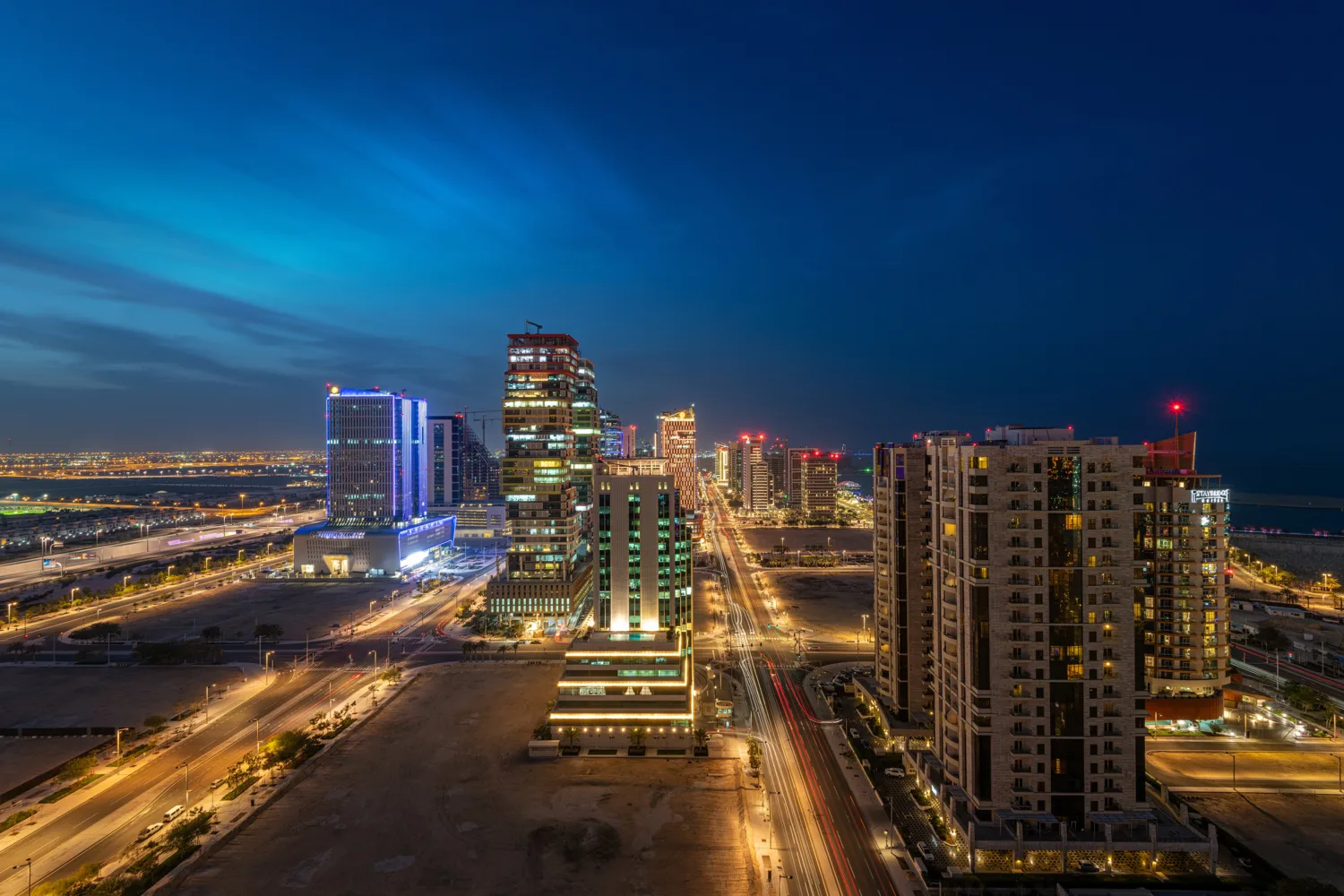 Aerial view of Lusail City buildings at night