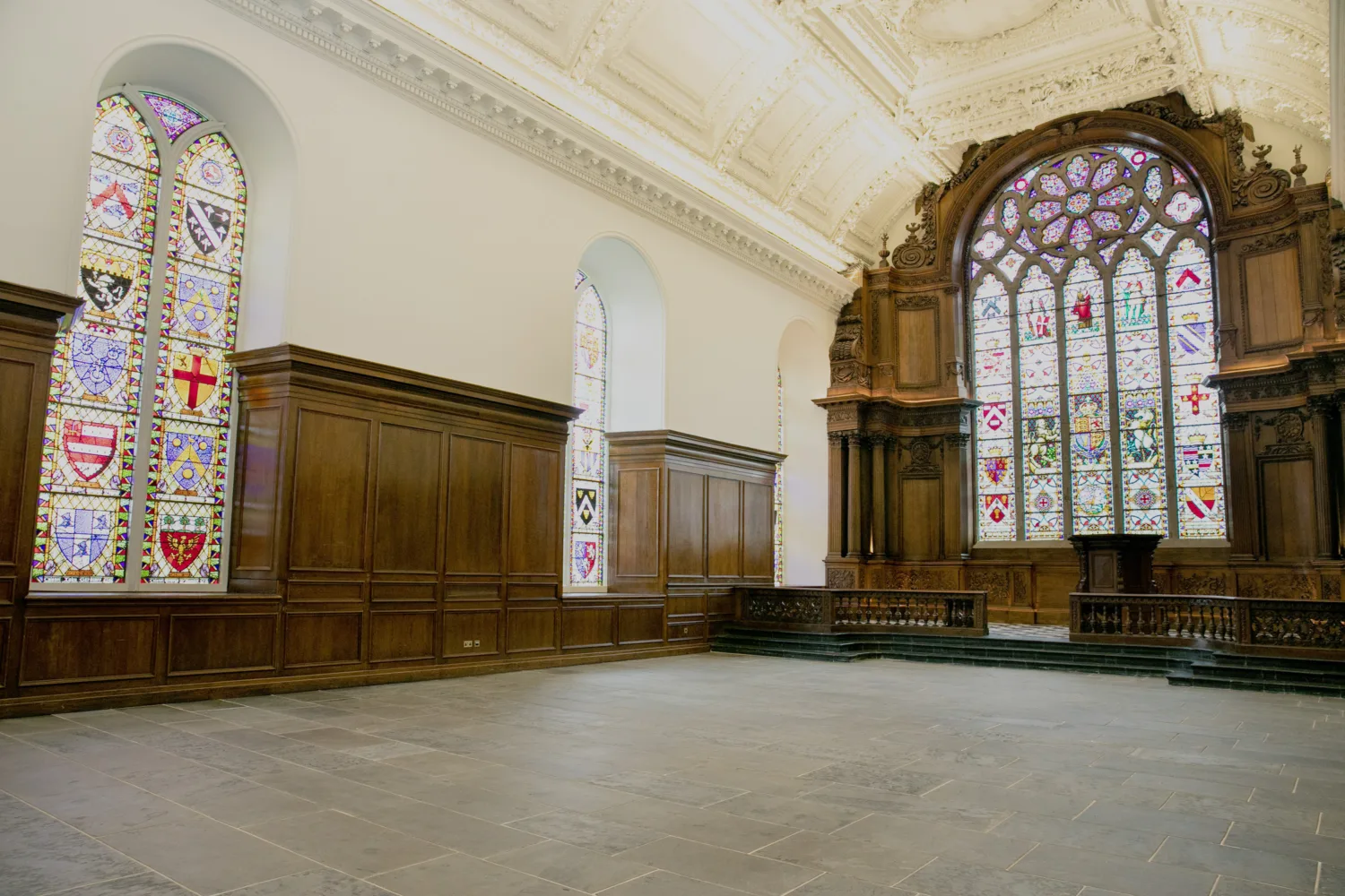 Internal view of old chapel with stain glass windows