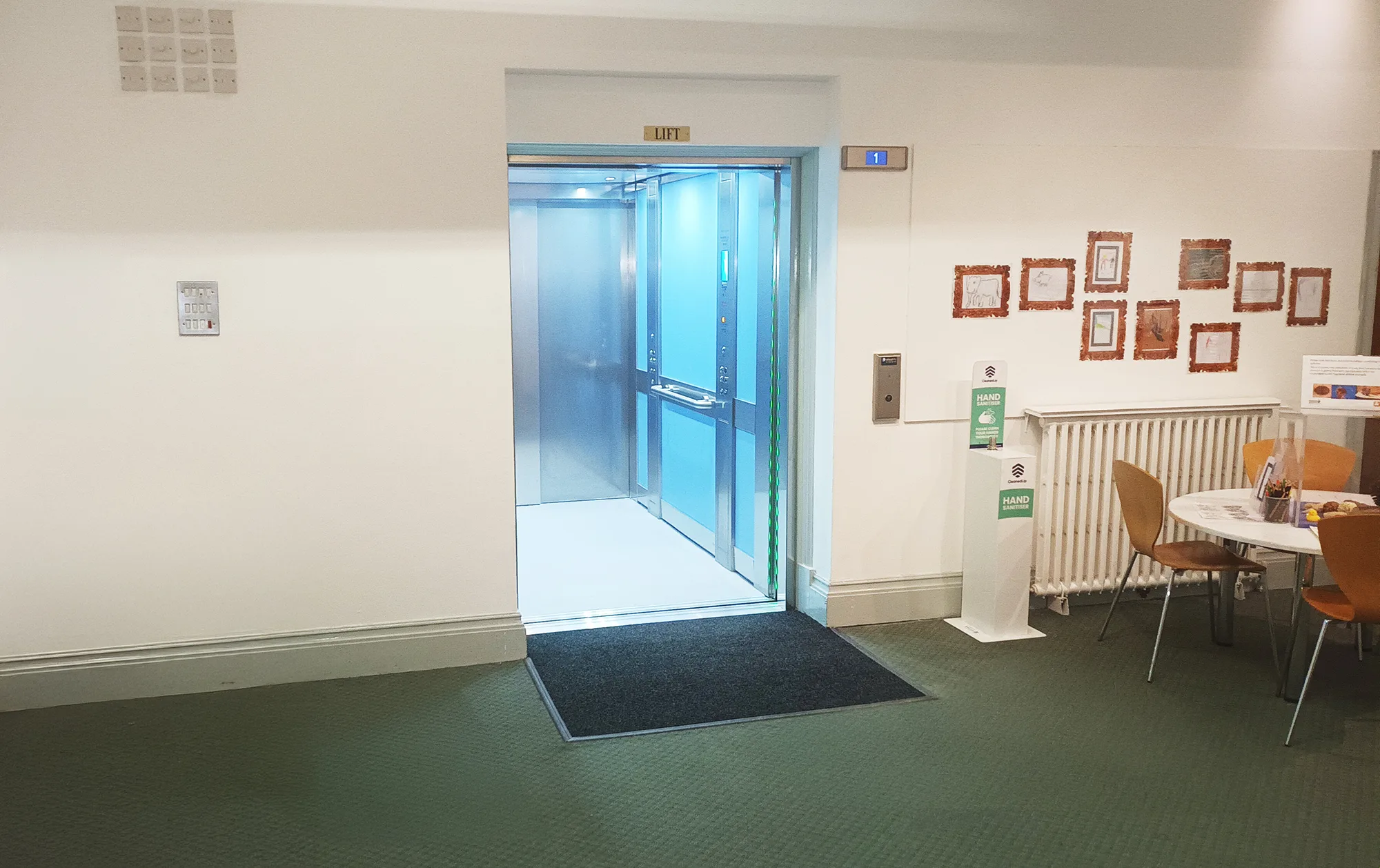 Lift open with table and hand sanitizer to right side