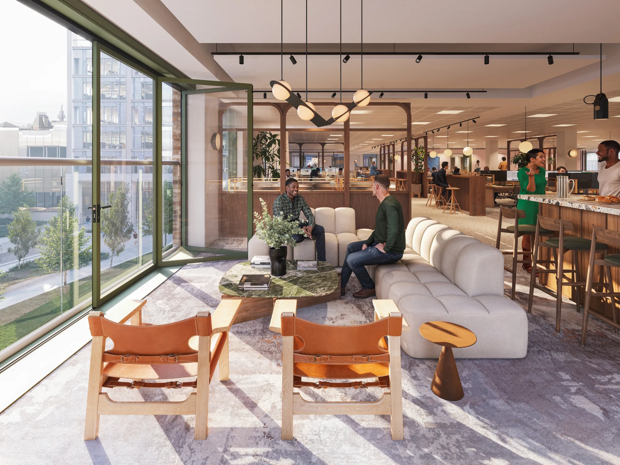 Lobby area with high patterned ceiling, large windows, and seating including chairs and poufs. A round planter with a tree is centered. Visible text reads “Pilgrim Place” on the left wall. Several people are standing and sitting throughout the space.