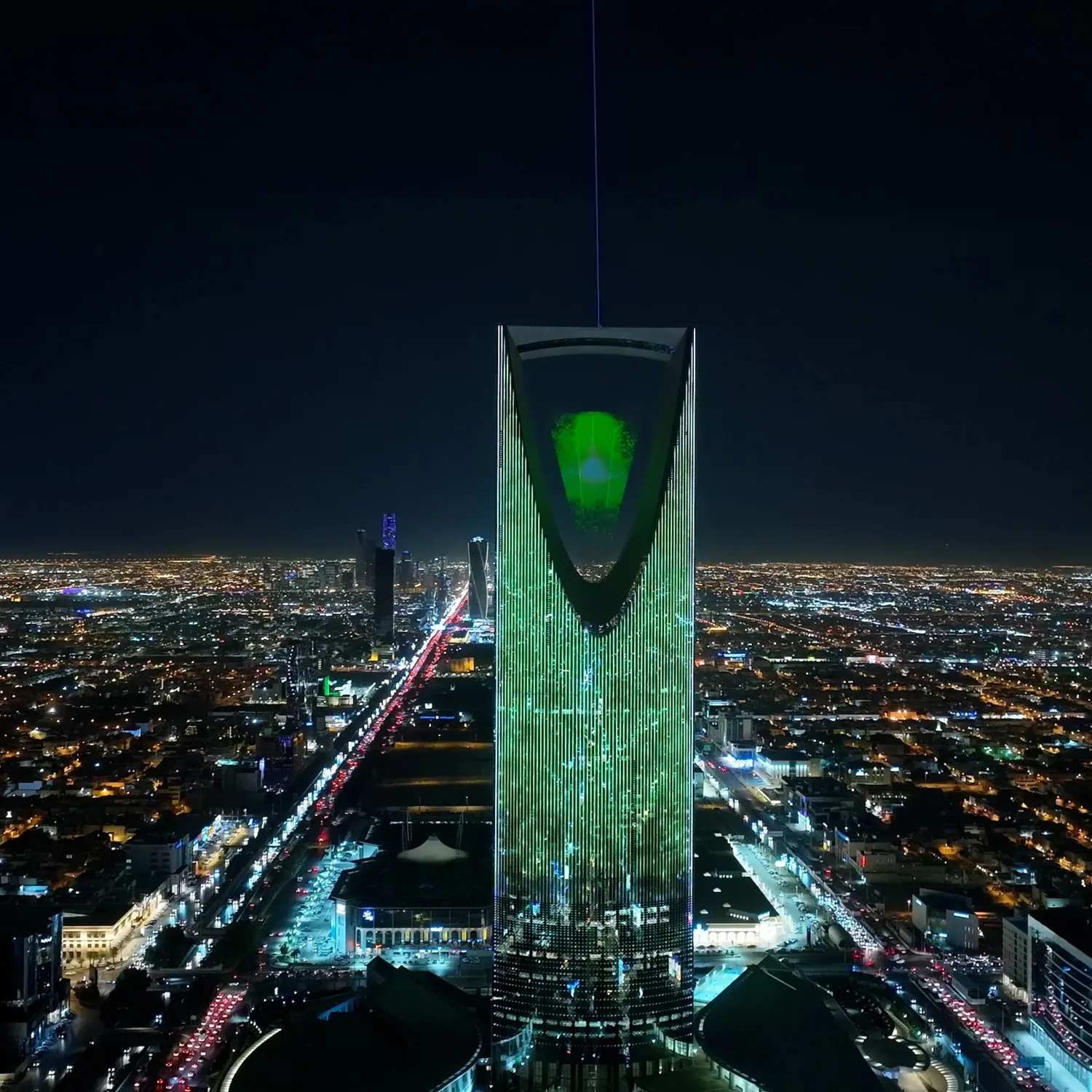 The art installation suspended in Kingdom Centre Tower illuminated in the night sky of Riyadh