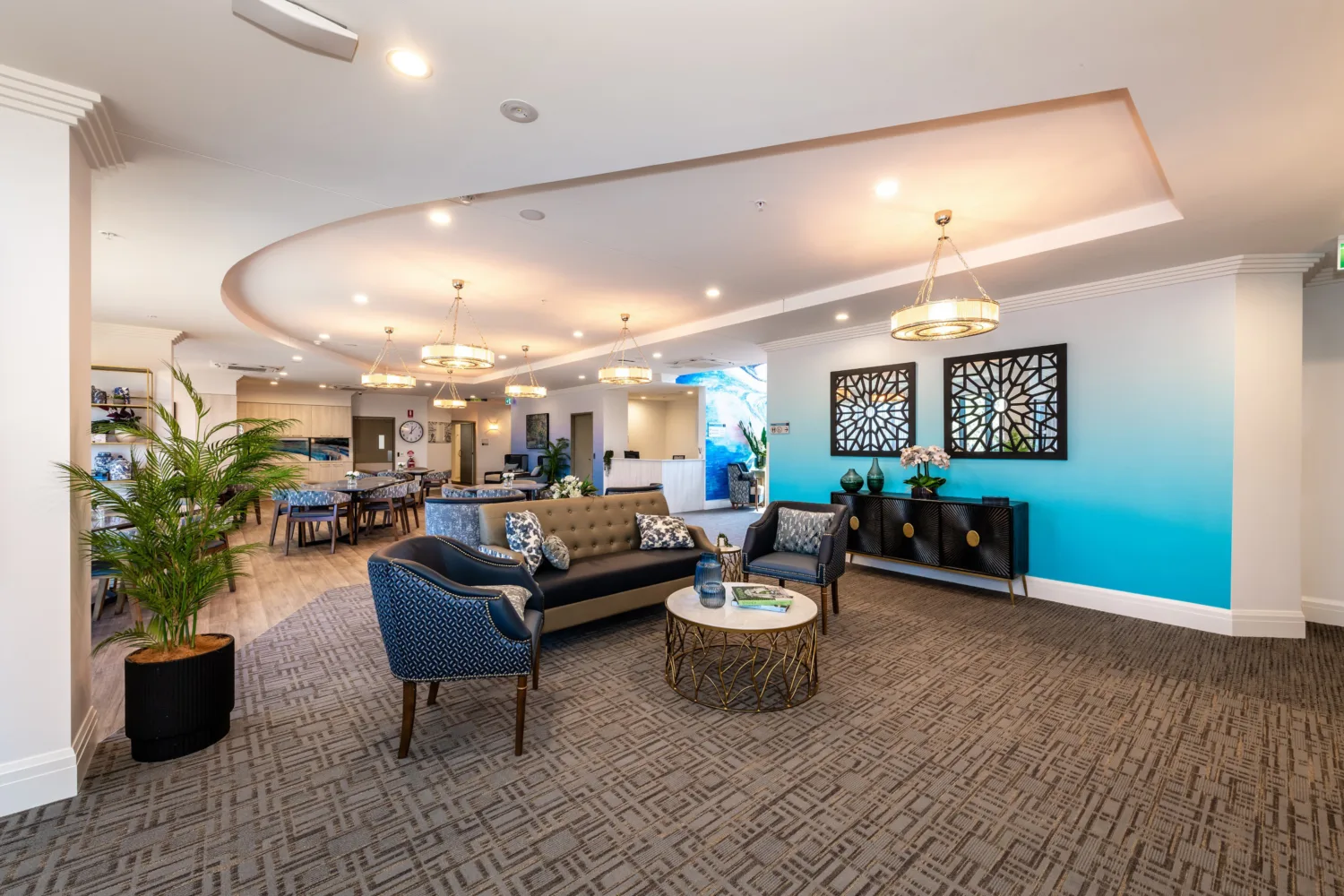 Interior Livingroom with cozy sofas and ambient lights