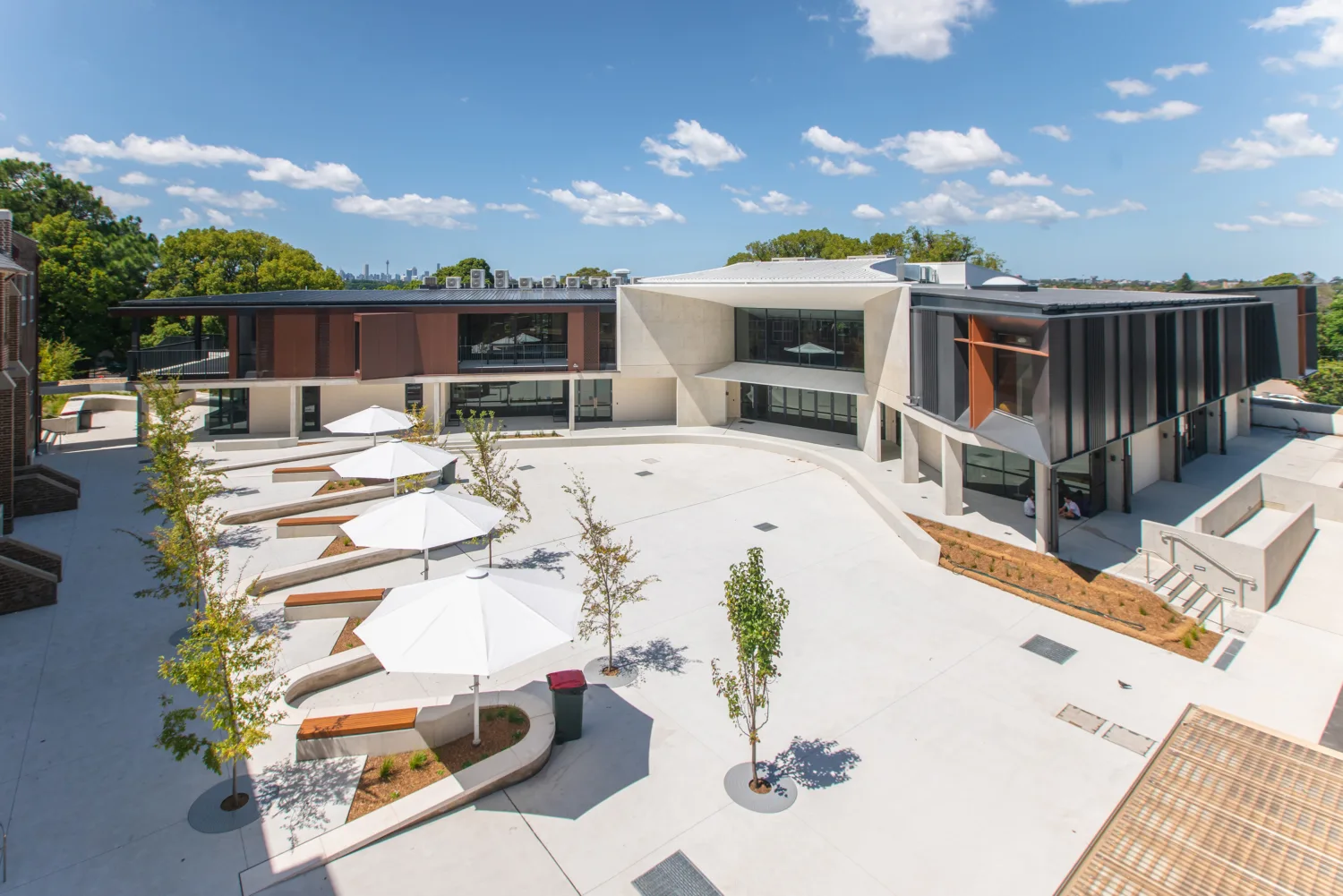 Main building and courtyard seating area from above.