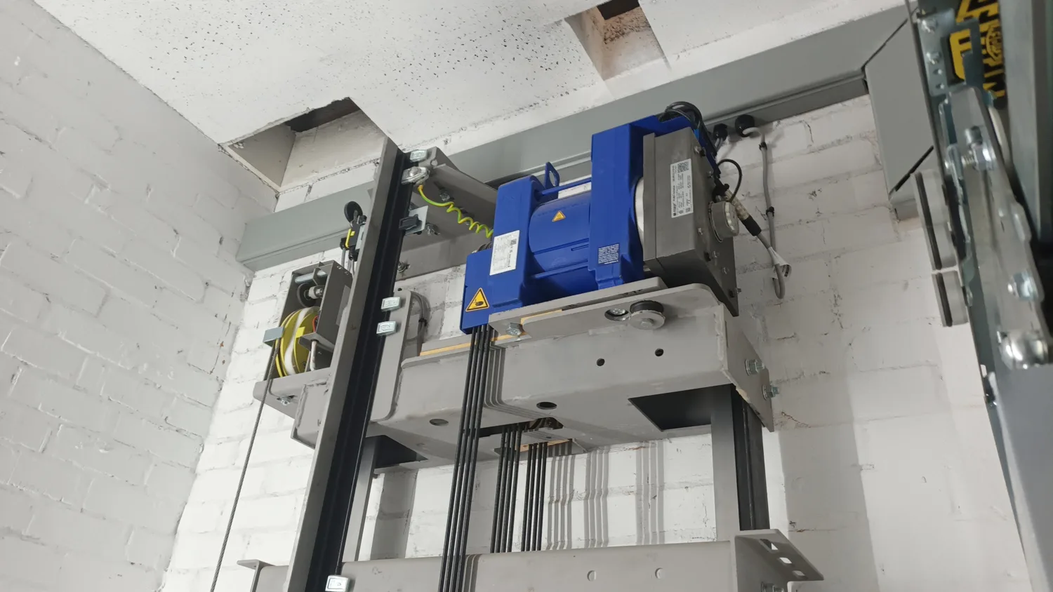 Engineering above a lift showing key technical parts
