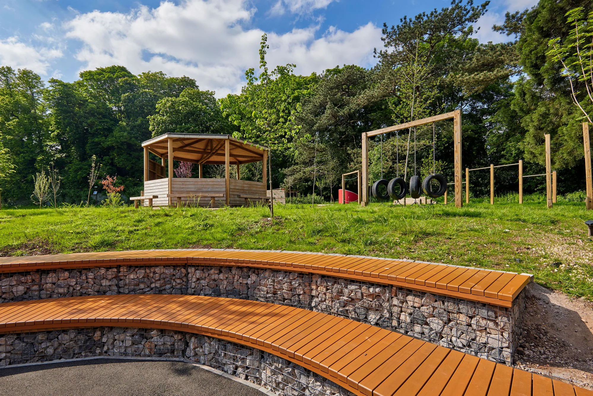 Outside play area surrounded by trees