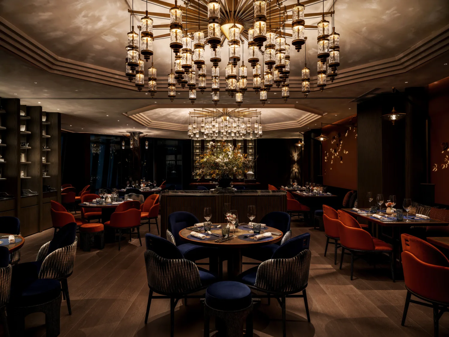 Main Dining room of the Ki Tin with an elegant chandelier at the ceiling. Ambient lighting is also giving a luxurious ambience.