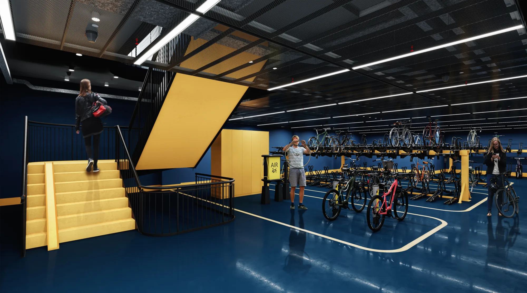 Cycle storage room with people and their bicycles.